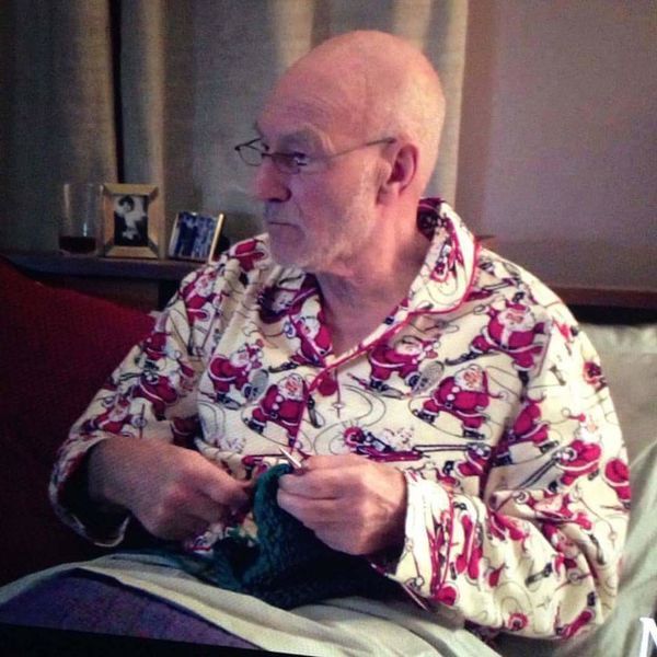 catherineWhit09's tweet photo. Since it's Christmas Eve here is Patrick Stewart knitting in Santa jammies @StarTrek https://t.co/251fSjQniV