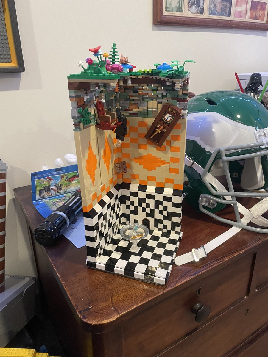 “Down the rabbit hole” (There’s 6 legs not on a minifigure within this build try and find them)