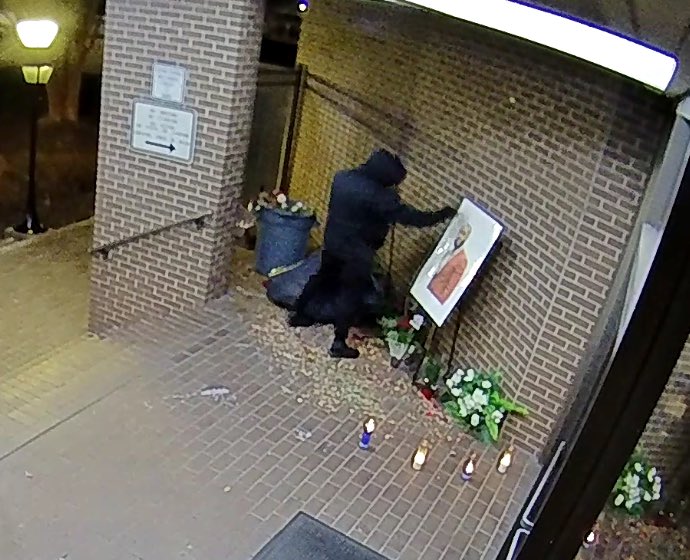At approximately 12:40 a.m. last night an unknown individual dressed in all black clothing removed the memorial for Steve Perkins from the front of Decatur City Hall.  The activity was captured on security video at City Hall, but the person has not been identified.