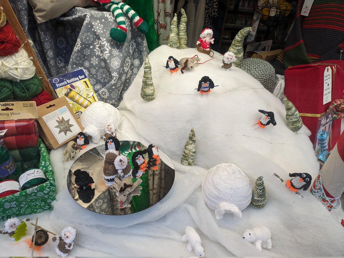zeetha's tweet image. As usual some lovely Christmas shop window displays in Ringwood. The fabric shop is always so ingenious! #ringwood #christmas #shopwindow