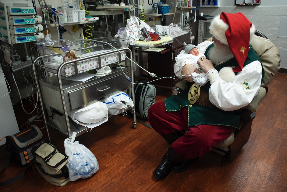 Santa Claus, portrayed by Steve Southard, pays a visit to 9-day-old William "Liam" Clairday on Dec. 20, 2018, at St. Bernards Medical Center's Neonatal Intensive Care Unit (NICU) in Jonesboro, Arkansas. 

#SantaClaus #Santa #fromthearchives