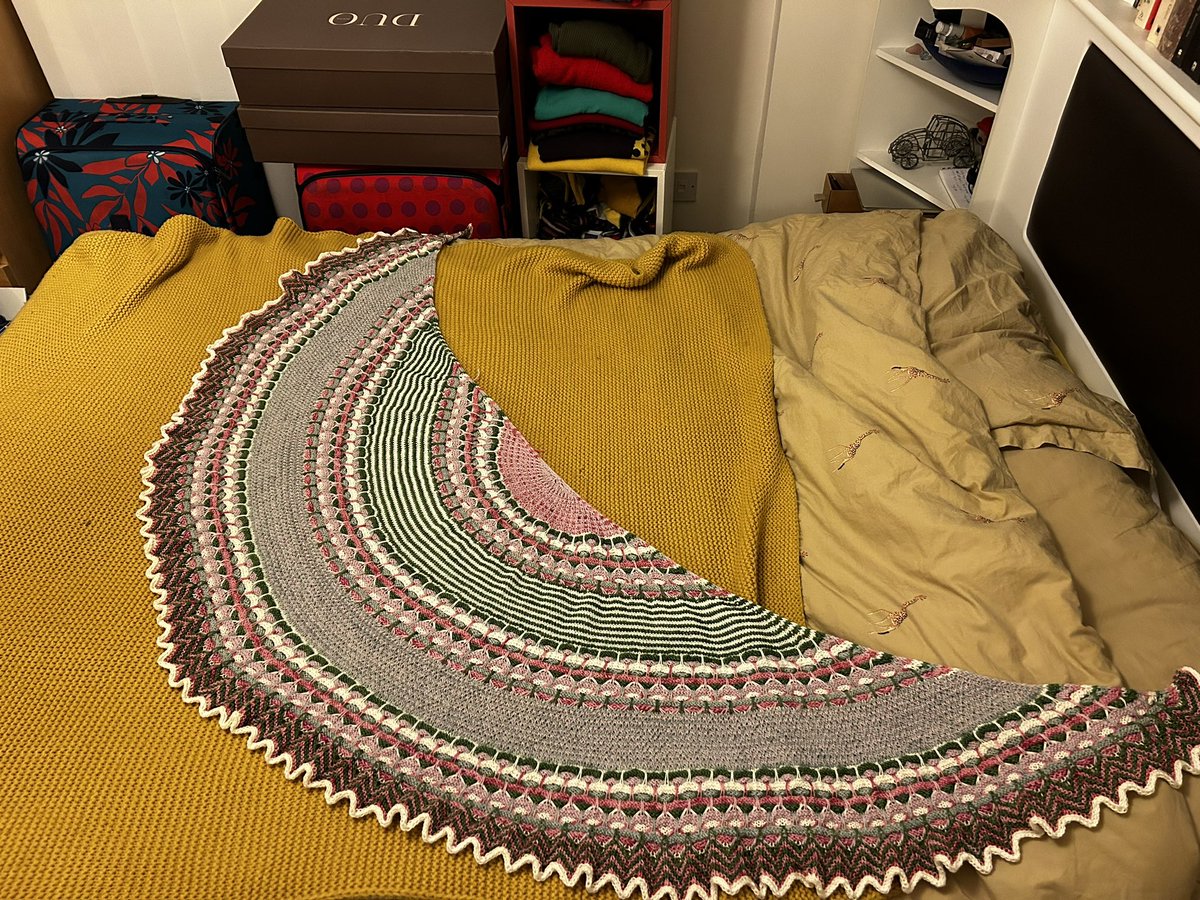 KnitWit78's tweet photo. Oof! This took ages! Still need to block, so it will grow a bit more. Westknits Aurora Cabin Shawl, with a mixture of Birdstreet Yarn 4 Ply and Rowan Summerlite 4 Ply. 

And now for a glass of something fizzy! Merry Christmas if you’re celebrating tomorrow. #knittingtwitter https://t.co/PC4utF9UJc