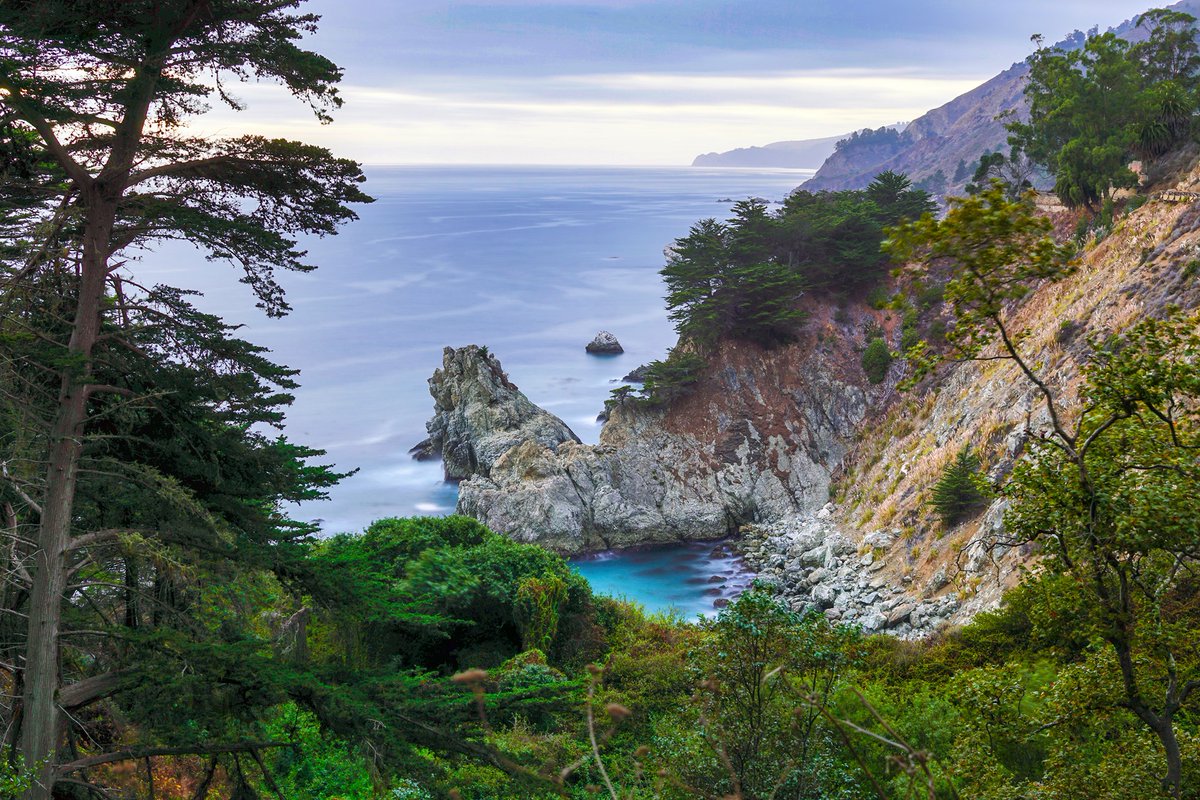 EZSaveNEarn's tweet photo. #McWay #Falls is an 80-foot-tall waterfall on the coast of Big Sur in central California that flows year-round from McWay Creek in Julia #PfeifferBurns State Park, about 37 miles south of #Carmel, into the Pacific Ocean. During high tide, it is a tidefall, a waterfall that empties directly into the ocean. 

#beach #nature #photography