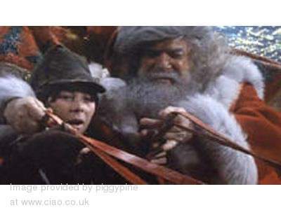 Ever notice in "Santa Clause:The Movie" when Santy meets the little starving, freezing homeless orphan that he never actually gives him any help? Just a poxy snowglobe &amp; then fecks off back to his magical palace &amp; an army of slaves, after only working one day year.