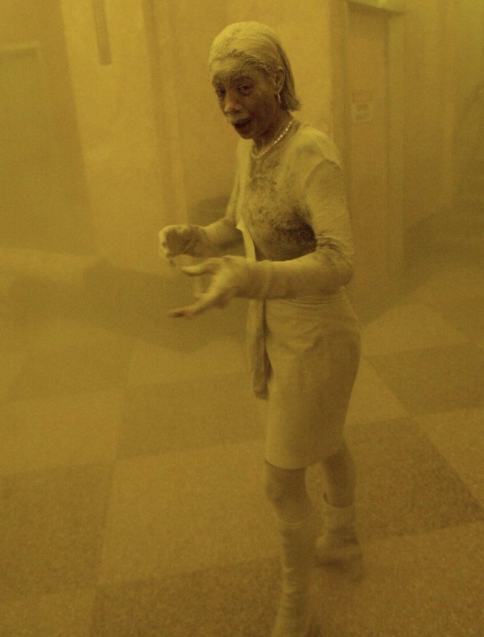 fasc1nate's tweet image. This photo captures 28-year-old Marcy Borders, a Bank of America employee at the World Trade Center as she takes shelter in an adjacent office building following the collapse of the South Tower.

Borders was working on the 81st floor of the North Tower when the attack began, and…