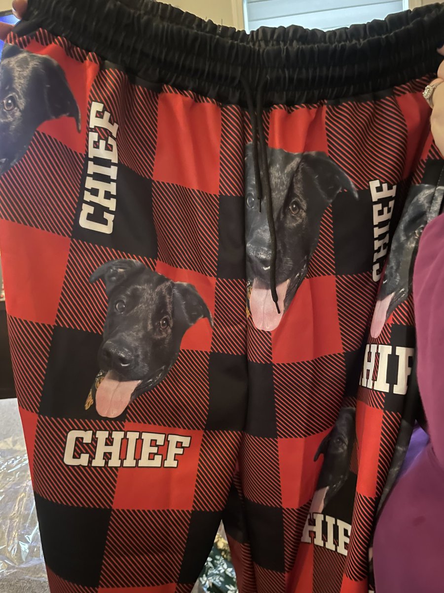 UncleWalruss's tweet photo. My wife and I got PJs with our dog on it for Christmas and I don’t think I’m ever taking them off. https://t.co/eRmOTUd8KE