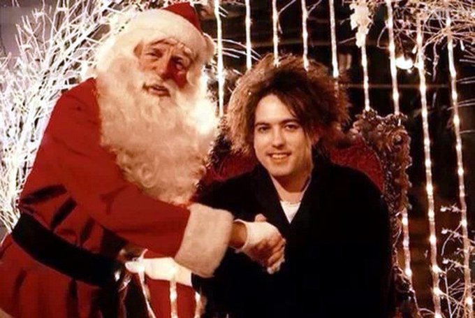 crockpics's tweet photo. Robert Smith and Santa Claus in London, 1985. Photo by PG Brunelli https://t.co/vuWGINFJJn