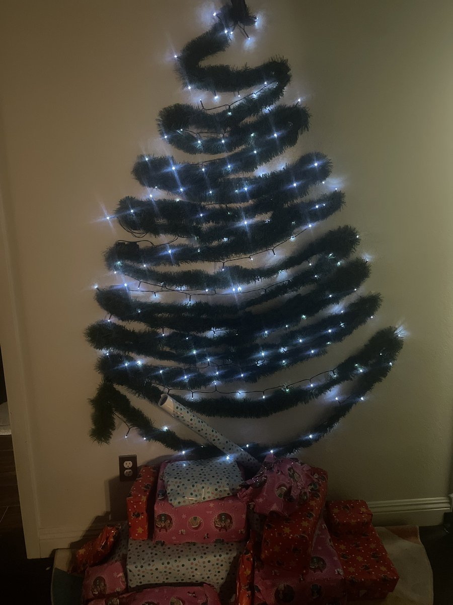 When you have no room for a tree, your wife improvises with tinsel and a crow ornament for a topper. It actually feels like a Poe Christmas for the first time since we moved in. #christmas2023