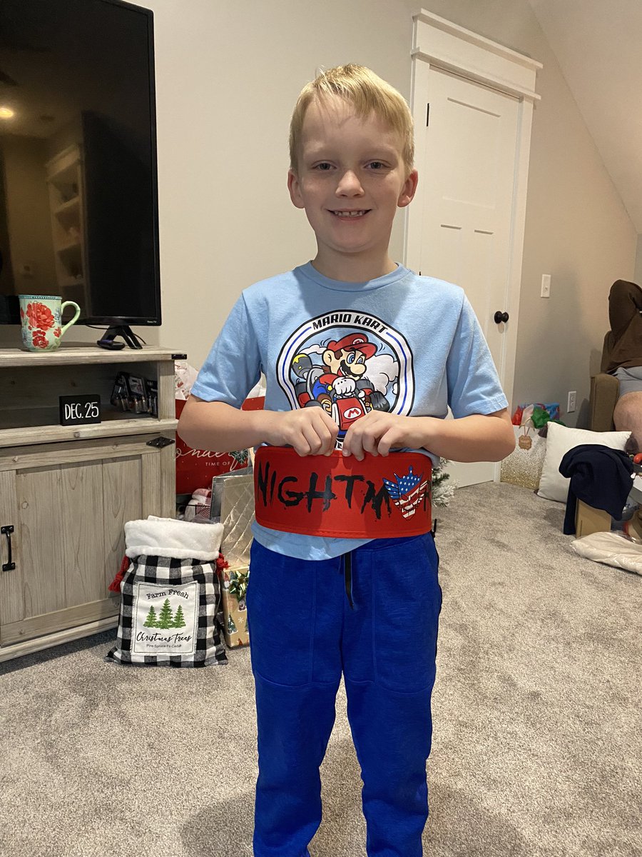 coach_stephen15's tweet photo. @CodyRhodes this little fella is loving his nightmare belt! https://t.co/fptQalu9bb