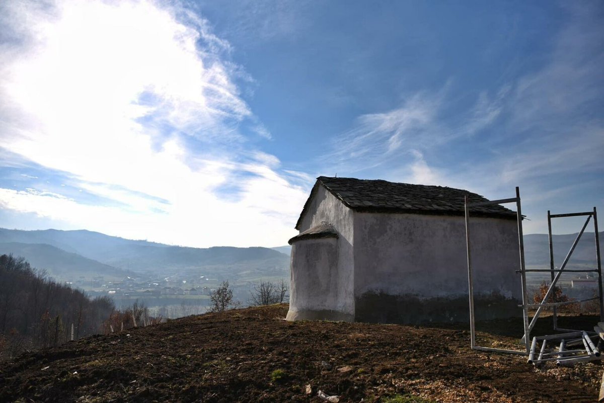 SerbEagleAI's tweet photo. 🚨BREAKING: The ongoing #Albanian campaign of stealing and converting the 🇷🇸 Serb Orthodox cultural and religious heritage in #Kosovo and #Metohija fiercely continues. 

The so called Ministry of Culture  from #Pristina has self-initiatively begun “a reconstruction” of the  Orthodox cemetery church in the village of Gornje Vinarce, 7 km west of Kosovska #Mitrovica. Besides not contacting the Serb Orthdox Church in regard this reconstruction, the Ministry has taken a further step by proclaiming  this church “Catholic,” clearly intending to take over and convert the Serb Orthodox heritage. The church itself has been subject to vandalism and damage by the members of the terrorist organization of Kosovo Liberation Army aka #KLA/#UCK, particularly after the expulsion of the Serb population in 1999.

This church however has been listed as a protected monument of Orthodox heritage even by the so called Ministry of Culture in Pristina since 2016. In front of the church there is a sign with a logo of the so called Ministry of Culture which we blurred on photos and which mentions the name “Catholic Church in Vinarce”,  listing as well the two companies carrying out the work, which is reportedly nearing  completion.

For public awareness, this Serb Orthodox church has existed since the 14th  century in a village that was then purely Serbian, with 15 Serb households, as recorded in a Ottoman census of Isa-beg Ishaković in  1455, shortly after the Battle of Kosovo in the area. A document  published by the Oriental Institute in Sarajevo in 1964, with other  Ottoman censuses of that time, shows the demographics at that time. The  census mentions vineyards in this  village, which is apparently how it got its name. 

The church’s  architectural structure clearly shows it resembles cemetery chapels from  the 14th-15th centuries typical of Orthodox Christian tradition. In the village, no presence of a Roman Catholic community is mentioned, and the Roman Catholic diocese has never used this church, nor does it have any written data or material evidence  of its ownership in history.

This is only one incident of a kind lately and we hope @UNESCO to finally react and to put all Serb Orthodox heritage on the list of endangered World heritage in Kosovo and Metohija! 

We call also @visegrad24 @JackPosobiec @RadioGenoa @scotthortonshow @KitKlarenberg to RT this! 🙏