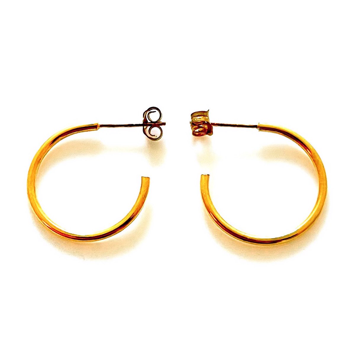 Up close, every detail matters. Our gold plated hoops are a testament to fine craftsmanship. #DetailInGold #ElegantAccessories