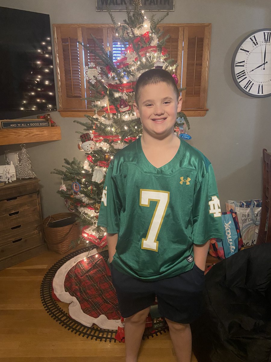 johncgebhart's tweet photo. Reid’s Christmas present. Green jersey of his favorite Notre Dame player. @AudricEstime Merry Christmas!! https://t.co/ngbw5ExvrH