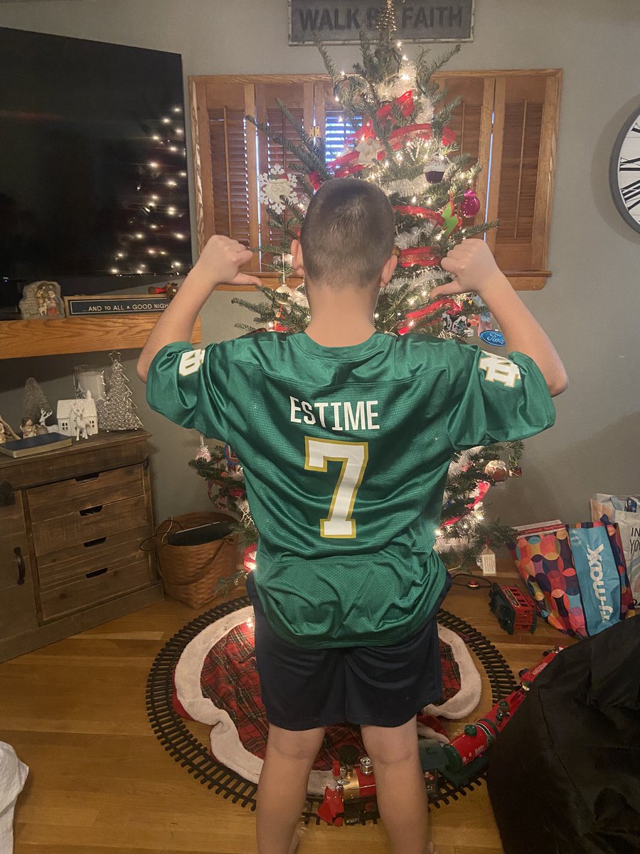johncgebhart's tweet photo. Reid’s Christmas present. Green jersey of his favorite Notre Dame player. @AudricEstime Merry Christmas!! https://t.co/ngbw5ExvrH