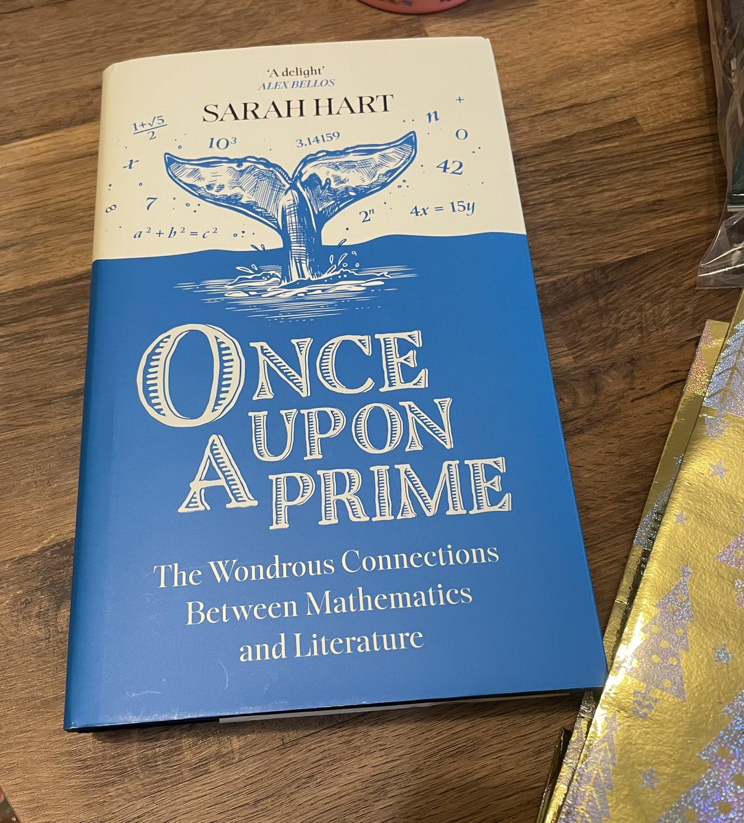 mathsjem's tweet image. Annual tweet of my maths-related Christmas presents! This year: badges, socks and book (which I’m very much looking forward to reading!). 👍🎁🎄