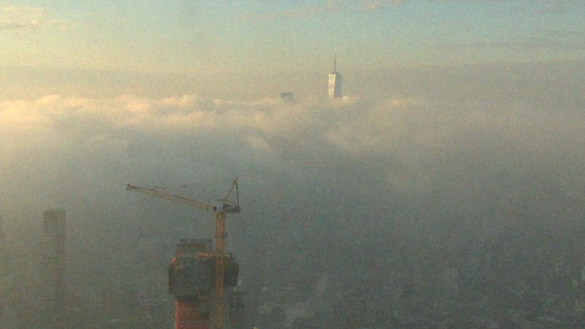 One World Trade peeking through the clouds @abc7ny