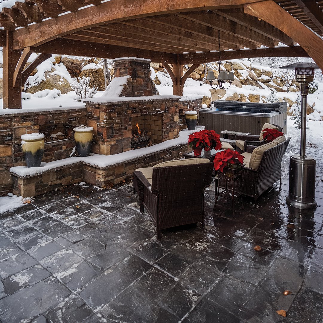 Stepping into a winter wonderland in a pergola, where the fireplace radiates holiday cheer and the snow blankets the space in serene beauty. Wishing you warmth, joy, and a heart full of gratitude this holiday season.