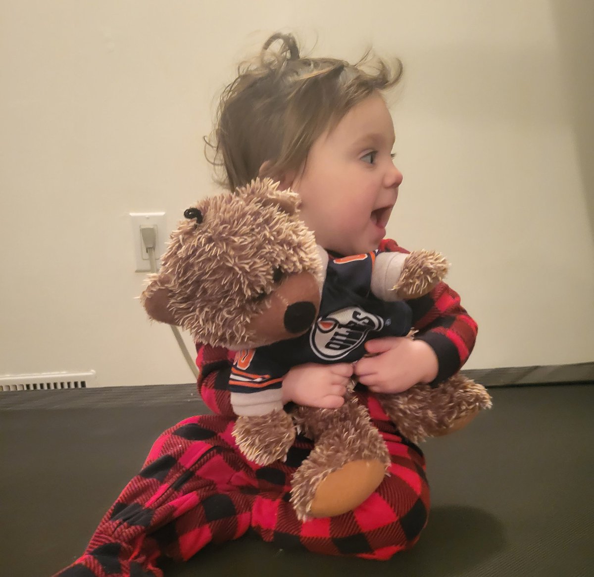 Hope you all experience even a fraction of this joy today, Merry Christmas from the little lady and Olive the Oilers' bear.