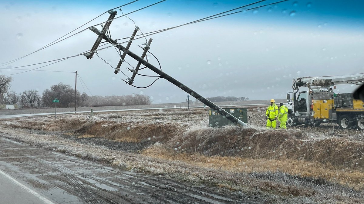 A huge thank you to all the road &amp; electric crews who are out working on Christmas and in this weather. This picture was taken around 11:30 this morning 9 mi west of Milford. Crews from Iowa Lakes Electric Coop are seen here assessing the situation. (Photo by the Dickinson Co SO)
