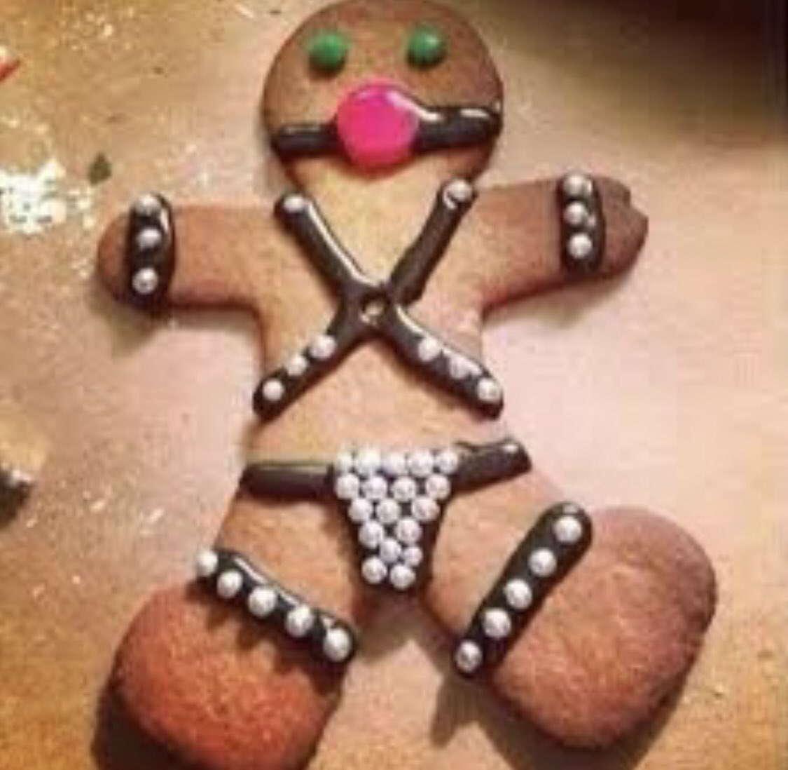 Mom had everyone decorate gingerbread men last night. This was K's.

He's not allowed to decorate them any more.