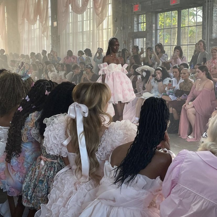 this photo from the selkie ss23 show looks like a fairy gathering