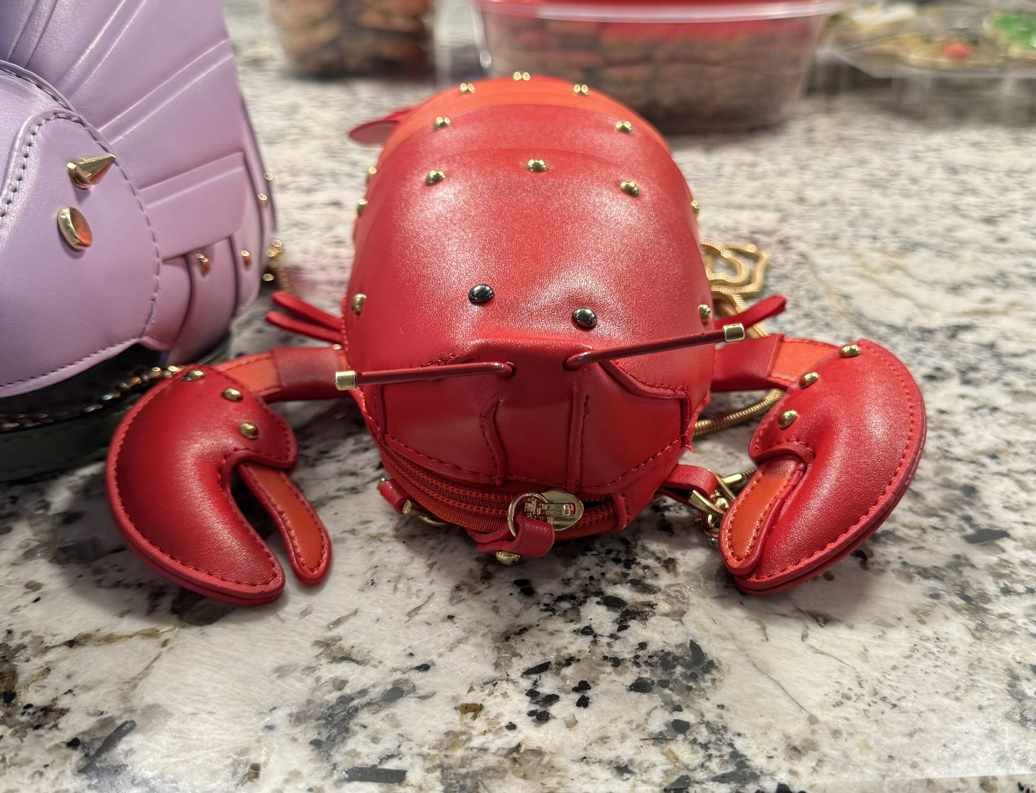 tigerparade.bsky.social on X best thing I received today was this glorious lobster purse I enjoy fun bags and now my dinosaur purses have an arthropod pal https t HvJ8ATXcq1 X