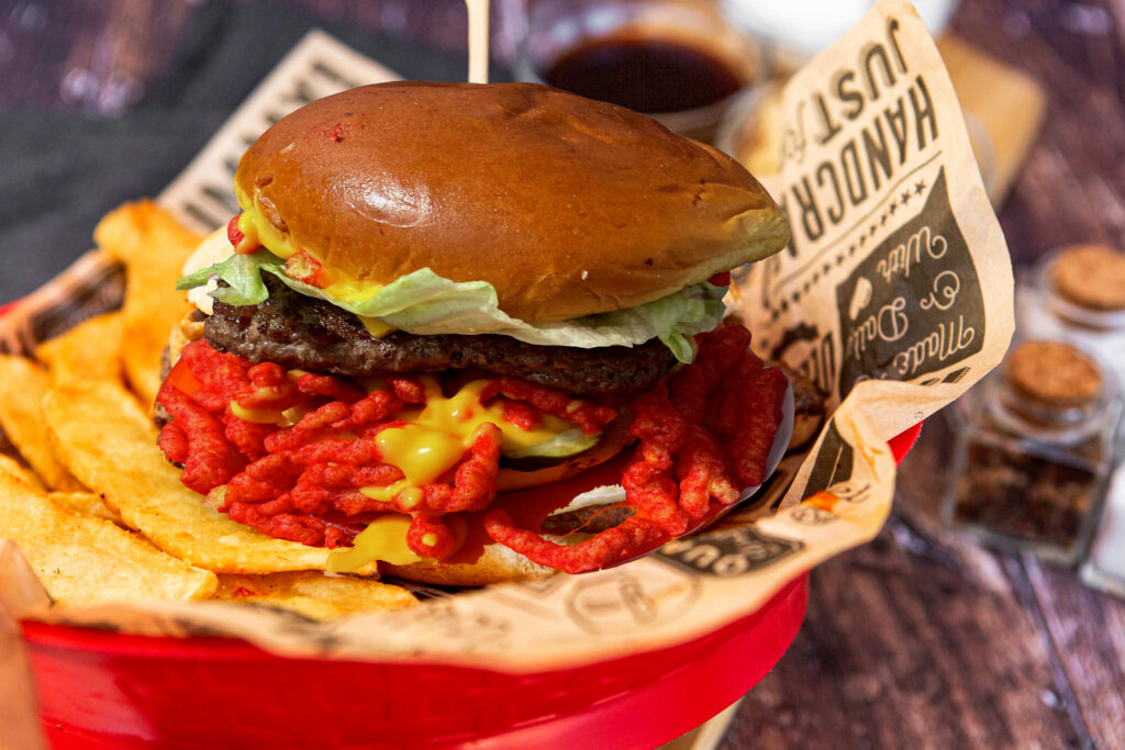 keloland's tweet photo. The 11th annual Downtown Sioux Falls Burger Battle is offering up a wide array of flavors with over 100 ounces of meat, about 13 varieties of bread, 2 burgers topped with flaming hot Cheetos and one scoop of ice cream. https://t.co/9J4Pe0zocg https://t.co/pooDO2Xls4