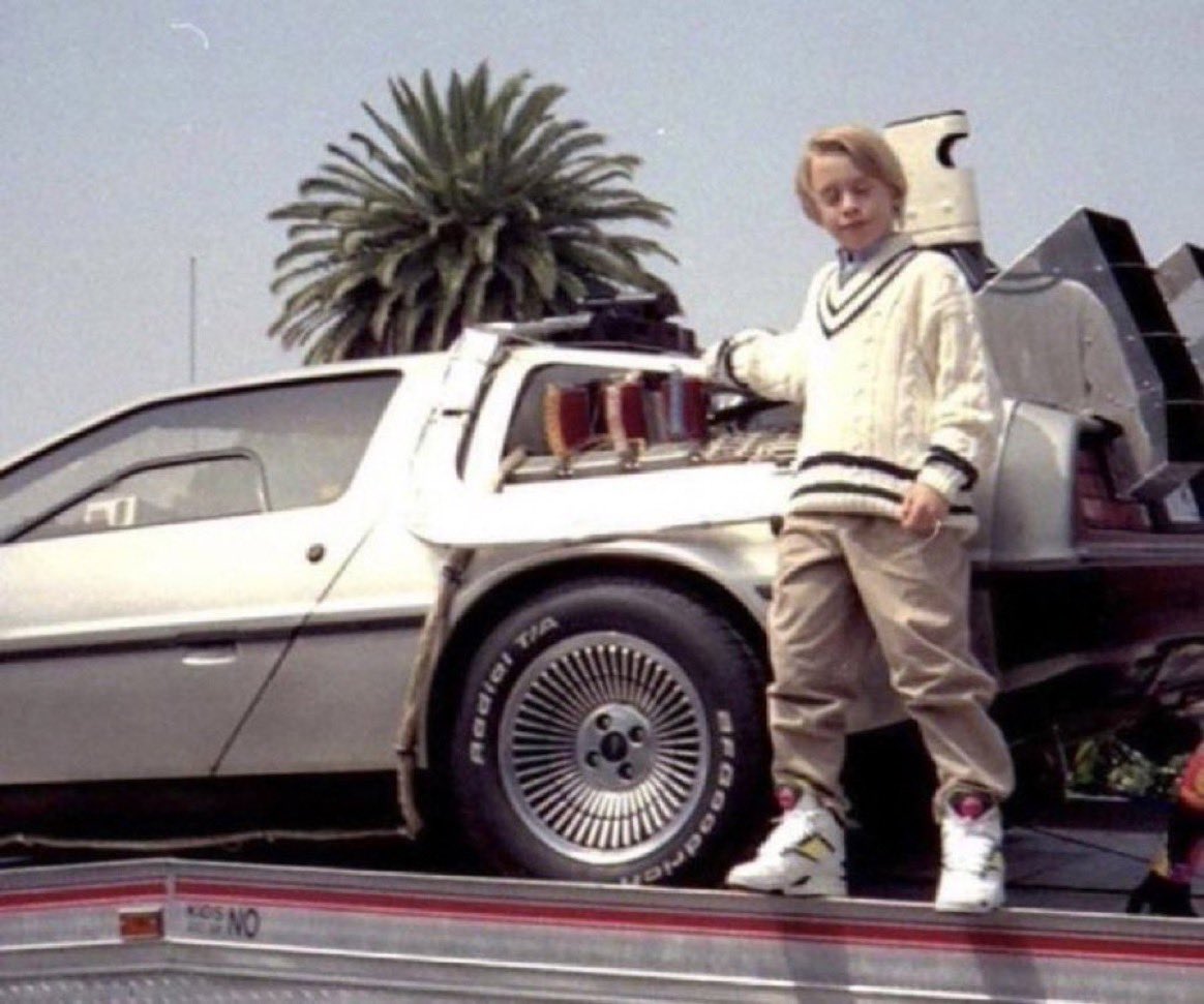 francoxkz's tweet photo. The AI is super intelligent, also the Ai

Prompt: ￼
You
Generate image with a young boy Macaulay Culkin alike with light blonde hair styled in a side part, about 9 years old, standing confidently beside a silver DeLorean. He's wearing a white varsity jacket https://t.co/gZAUAw64Hf