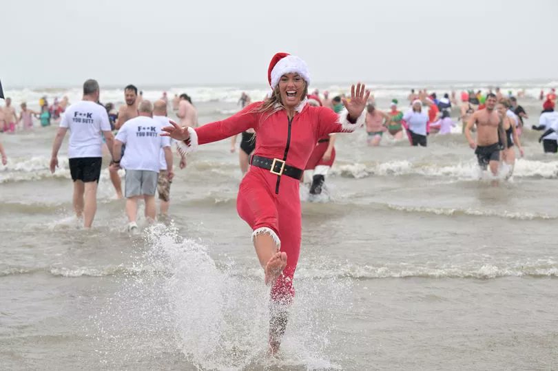 The best pictures from the Porthcawl Christmas Day swim: tinyurl.com/ywnzm2sv