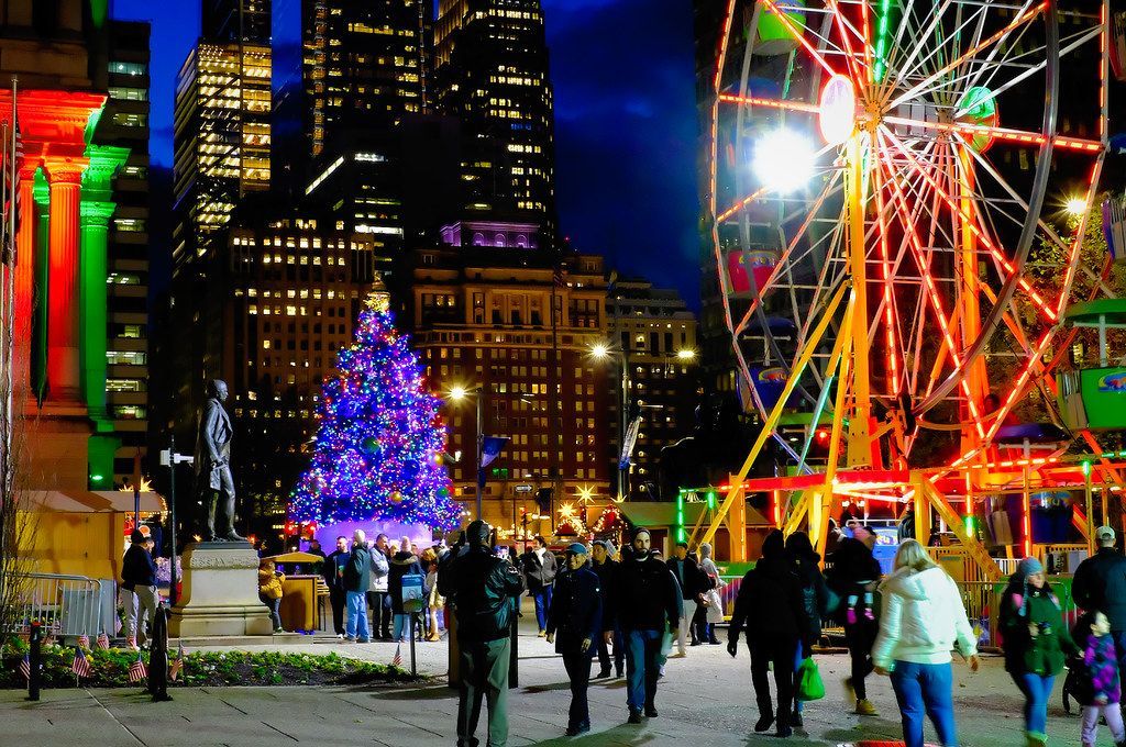 Christmas Village in at City Hall in Philadelphia buff.ly/3RXiqTs #photography #travel     #philadelphia #pennsylvania    #christmasvillage    #cityhall    #ferriswheel    #city    #downtown  #dilworthpark  #people #christmas  #christmasmarket  #buildings #shopping