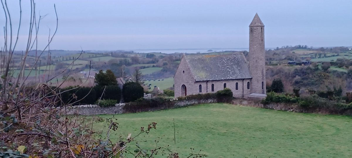 PatrickJMB's tweet photo. Saul Church and Round Tower with Strangford Lough in the distance
#StephensDay https://t.co/mxyVvldOqp