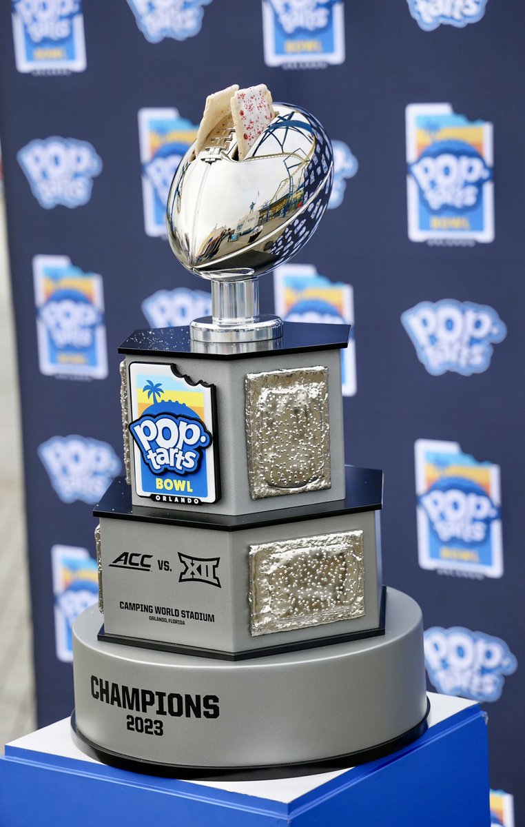 FOS's tweet photo. The new Pop-Tarts Bowl Trophy includes slots at the top to hold two actual Pop-Tarts 🏆 https://t.co/FVda0CUEz7