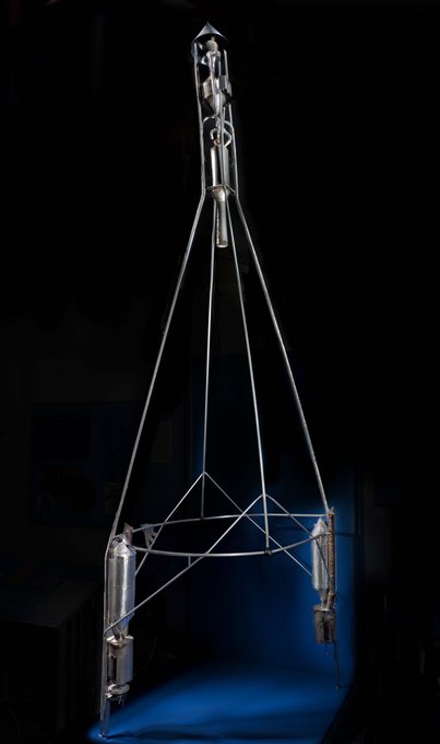 Hoopskirt rocket photographed against a black backdrop.