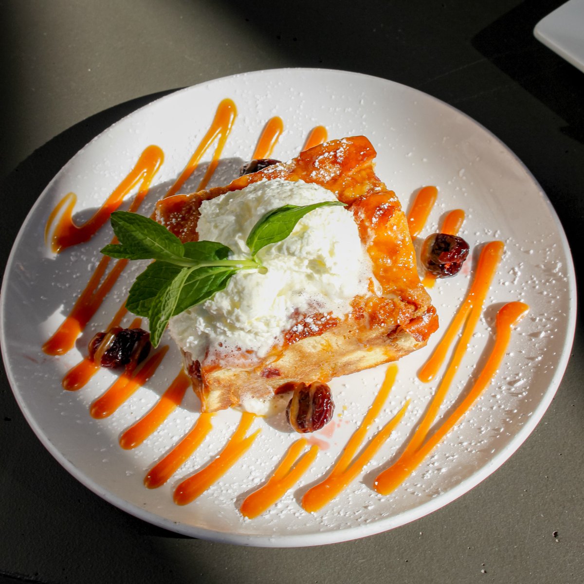 Nothing is sweeter than a plate of whiskey Bing cherry bread pudding! 🍒🥃🍞 Come take a bite out of this deliciousness and get your mood soaring with every spoonful! 😍🥄 #BreadPudding #Cherry #Whiskey #ThirstyLion