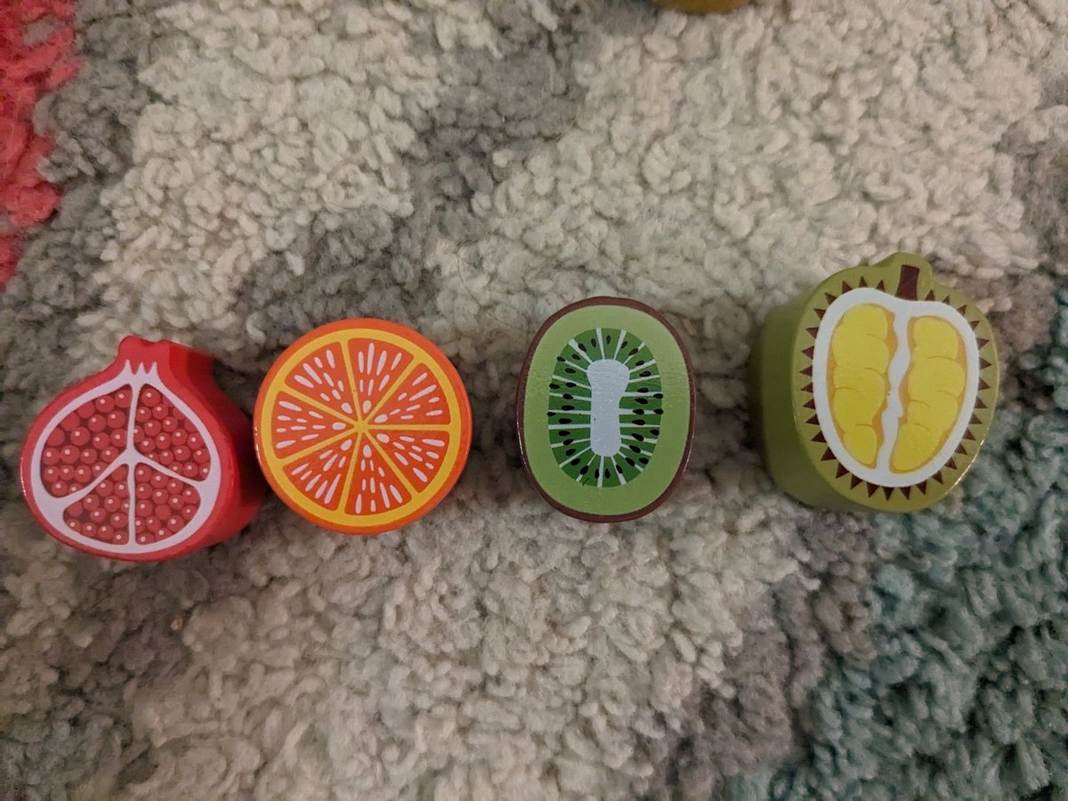 Pomegranate, orange, kiwi, and ???