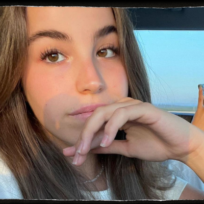 HenMazzig's tweet photo. Agam Berger, 19, was taken captive by Hamas terrorists on October 7 from the Nahal Oz army base.  

She only had time that morning to call her father, Shlomi, and tell him shots were being fired on base.  

Agam was later identified in a Hamas Telegram video, in which she is seen being led to a car, still dressed in her pajamas. 

 She is a talented violinist who’s been playing since the fourth grade and volunteers with special needs children.   

Bring them all home now.