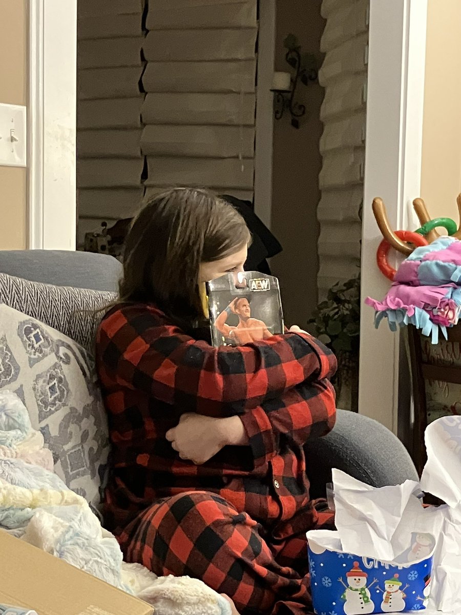LetTheBeardPlay's tweet photo. The excitement my daughter showed while getting her @starkmanjones #AEW action figure for Christmas was absolute! 

This is the one she’s been waiting to get for a while. https://t.co/T2dHoCbjDJ