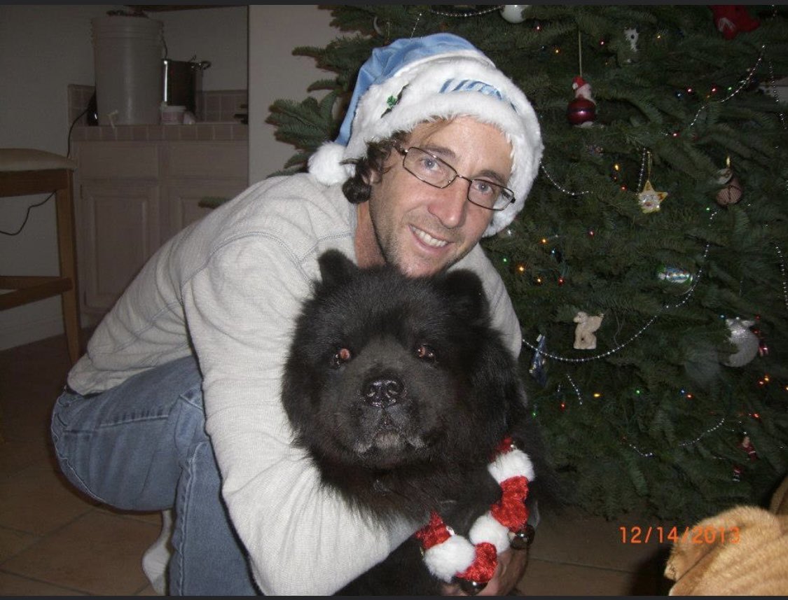 Me and my all time best pup, reppin the Lions on Christmas 10 years ago….