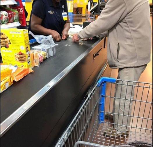 “My heart was warmed at Wal-Mart during lunch. This gentleman's items were scanned and he was given the total. He looks apologetically back at me and starts taking handfuls of change out of his pockets. He miscounts and starts to get flustered. Gives me a muttered, 'I'm so