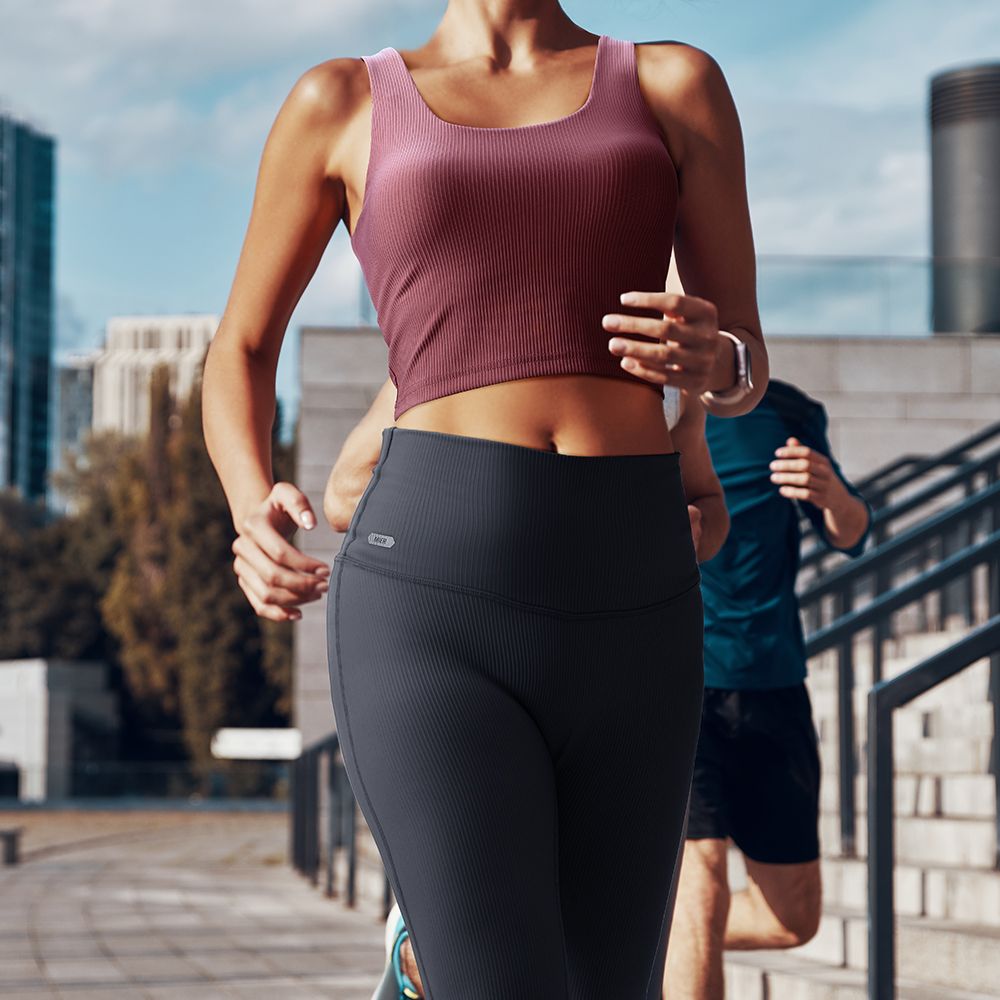 Buttery soft, breathable, and oh-so comfortable! This workout sports bra doubles as a casual tank, perfect for any day. The longer length and great support make it a favorite! #engineeredformotion #running #roadrunning #fitnessgear #comfort #racerbacktank #tanktop