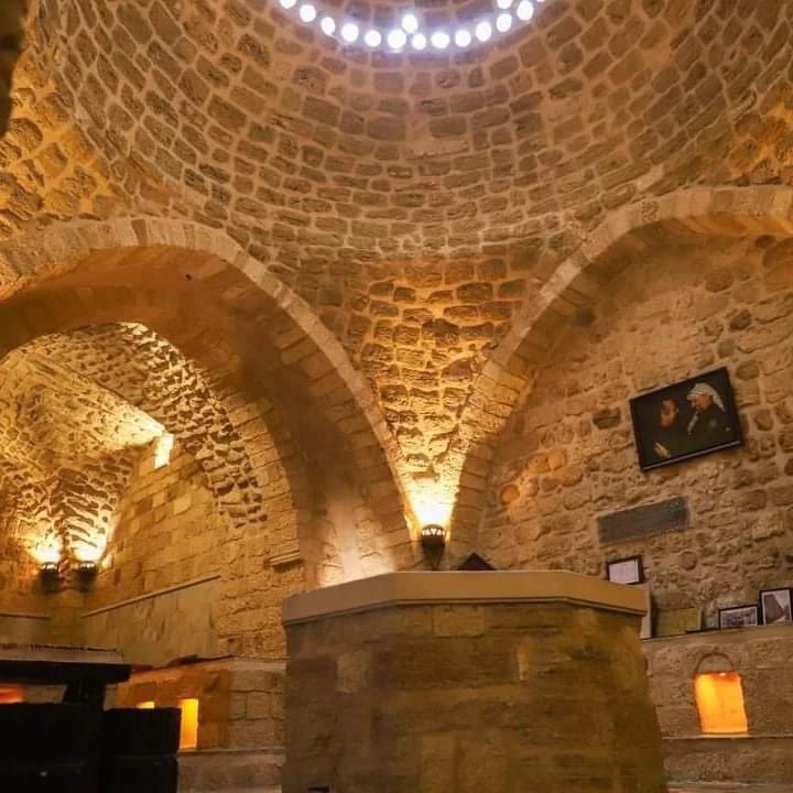 alijla2021's tweet photo. Isn't it true that the Taliban and ISIS are known for destroying antiquities and cultural heritage sites?  Last night, Israel attacked a 700-year-old Hammam in Gaza, Hamam Al Samra, a symbol of the city's heritage. Why would a 700-year-old building, recently maintained and renovated by international (French) experts, be targeted? It's challenging to understand the logic behind such actions, which seem barbaric. Who are the sons of darkness, and who are the sons of civilization? After 1967, Moche Dayan, the late Israeli Defence Minister, was frequently seen in Gaza taking antiquities. He amassed a large collection, which he gifted to friends in the U.S. I was pleased to see some of these items in Beirut, purchased by Lebanese businessmen and NGOs. Post-1967, Israel demolished parts of the old city of Gaza. While they prohibited building homes outside the old city, they allowed construction within it, on the condition that the Israeli army could take the stones from the demolished houses. You decide for yourself what to understand from all of this.