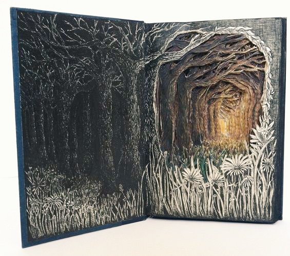 Isobelle Ouzman carves intricate 3D illustrations into discarded books found in dumpsters, recycling bins, and local thrift shops #womensart