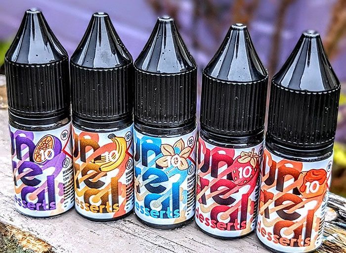 EcigClick's tweet image. Is the @Dispergo_online Unreal Desserts Nic Salt E-liquid range the &quot;custardian&quot; of flavour? (very poor - sorry)

Find out what Dan W thought in his review 👉 bit.ly/4avFfVB

Thank you @vapeclub !

#Dispergo #UnrealDesserts #Eliquid #Dessertvape #vape #vaping #Ecigclick