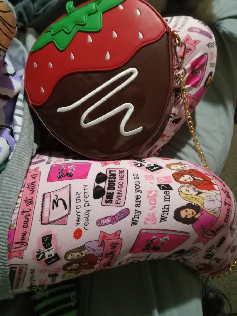 Mean Girls pjs + strawberry purse = my nieces and nephews are cooler than yours. 

.
.
.
.
#Christmas2023 #MeanGirls #strawberrylover #AuntieLove