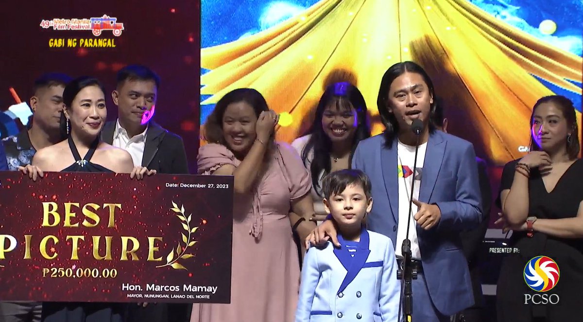 PhilippineStar's tweet photo. 'FIREFLY' BAGS MMFF BEST PICTURE 🏆👏

The fantasy film "Firefly" takes home the #2023MMFF Best Picture award during the MMFF Gabi ng Parangal on Wednesday.

Firefly stars actress Alessandra de Rossi and child actor Euwenn Mikaell, who bagged the Best Child Performer. (Facebook/MMFF)