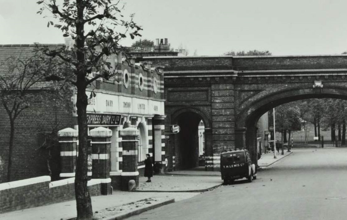 Former dairy on Rosendale Road #HerneHill next to the Grade II listed 1860s railway bridge. The dairy, photographed here in the 1950s, dates from the late 1890s and currently awaits a redevelopment that will retain the distinctive facade.
