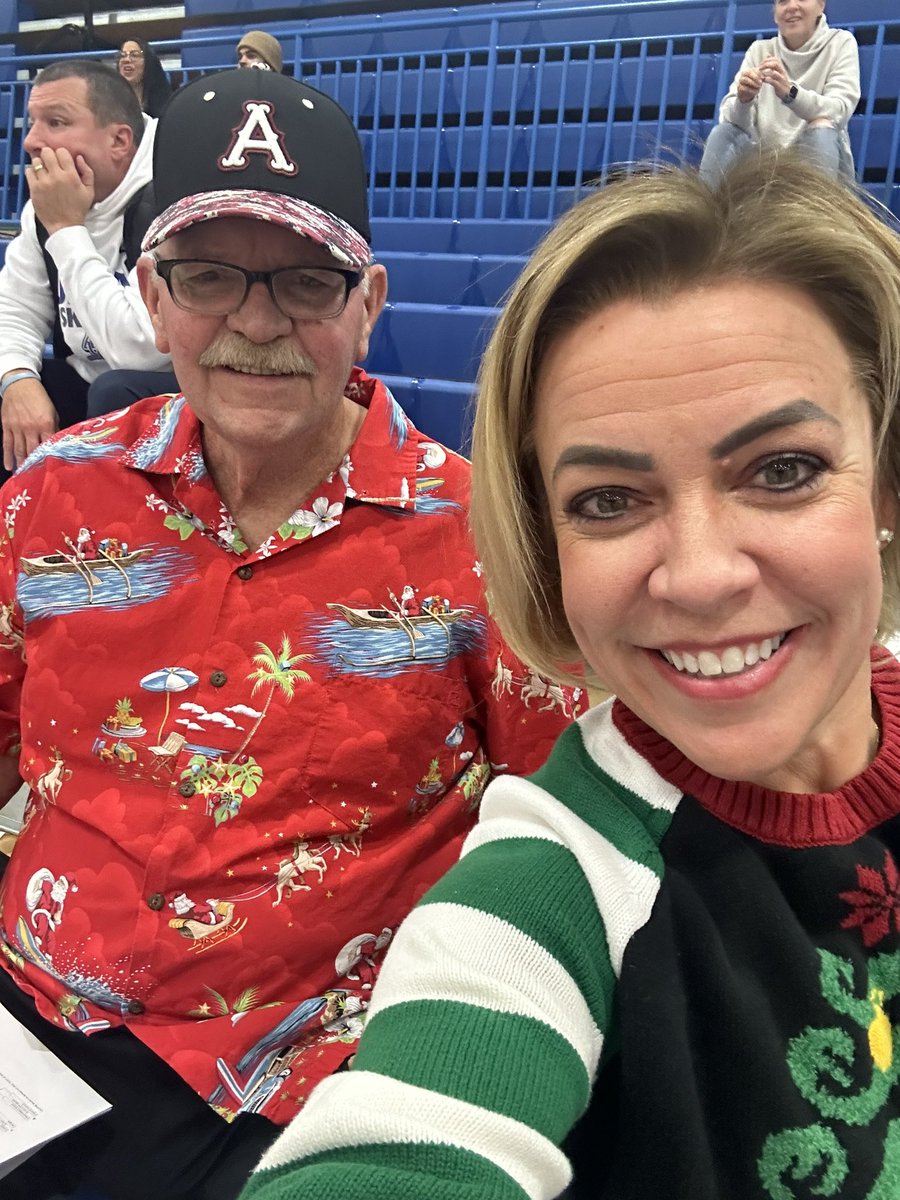 At Abbi’s holiday basketball tournament.  Day 1 theme is ugly sweater day. Apparently Papa and I are the only fans that got the memo 😂. Papa wins with his ugly Santa Hawaiian shirt 🎅🏼
Achs class 0f 66 and 98 
<a href="/argohs217/">Argo Community HS</a> <a href="/argonauts_ad/">ACHS Athletics</a> <a href="/ArgoGBall/">Argo GirlsBasketball</a> @SandburgPhysics <a href="/SandburgHS/">Carl Sandburg H.S.</a>