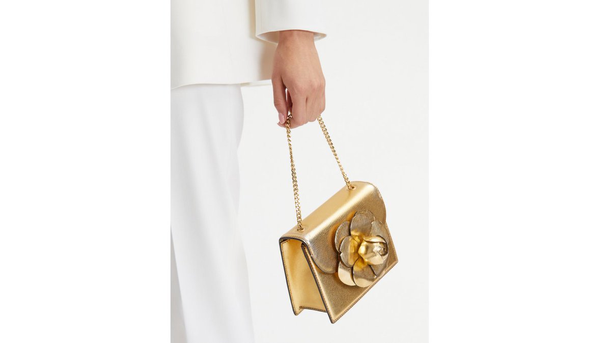 Metallics are always in style. This little Oscar de la Renta gold purse with signature camilla flower makes a perfect dress up accessory. 
#eveningbag #designerbag #goldclutch #oscardelarenta #eveningfashion #gown #dress #designerclothes #delraybeach #palmbeach #bocaratonfashion