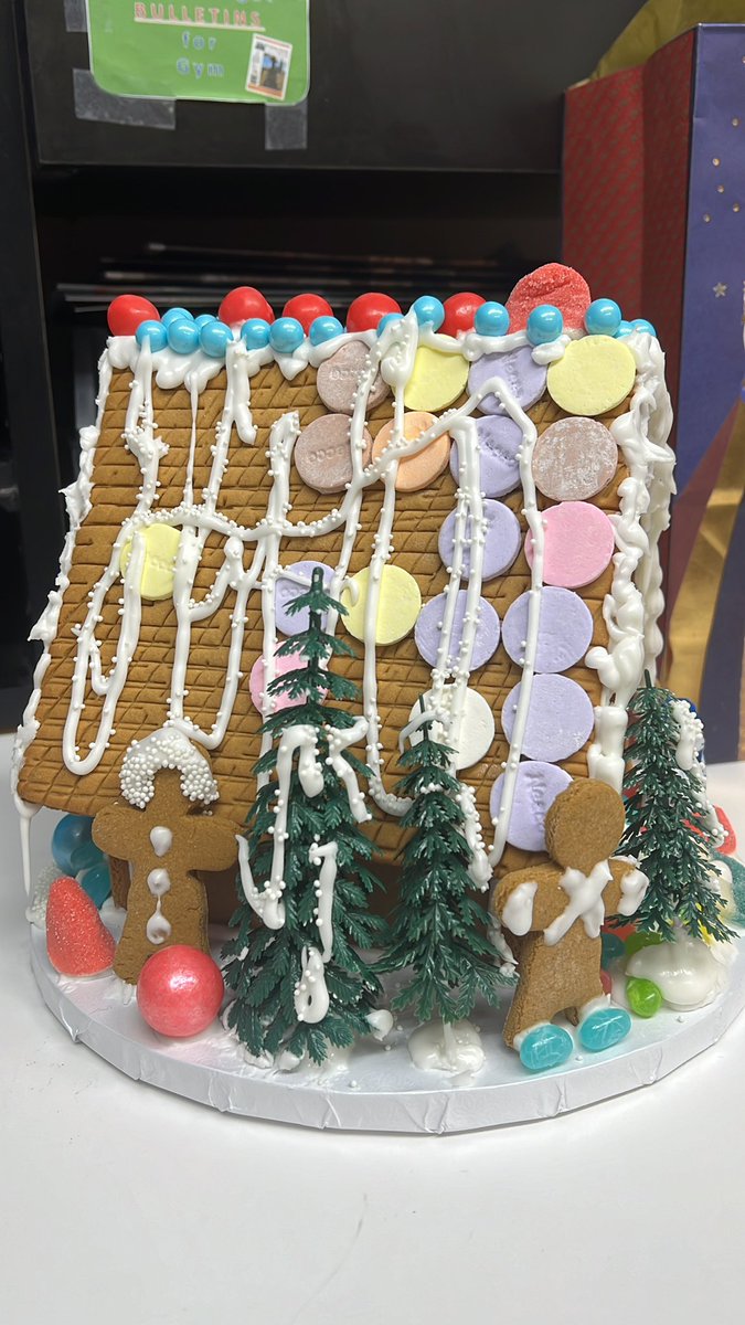 Merry Christmas from the All Saints Parish Office - which we modeled our gingerbread house off of! (All aspects can be explained if you want to go into detail…) <a href="/wiz_io/">Wiz</a> #WizGingerbread P.S. We could really use that gift card…as you can see our house is falling apart…