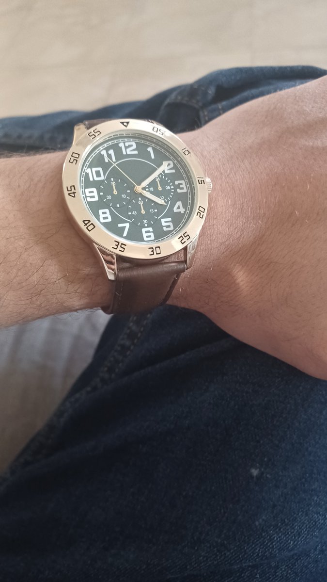 This is my watch. I paid $10 (yes ten dollars) for it. I like it. I would make one just like it using 22karat gold just so that the color doesn't fade away but that's nig shit. So I don't