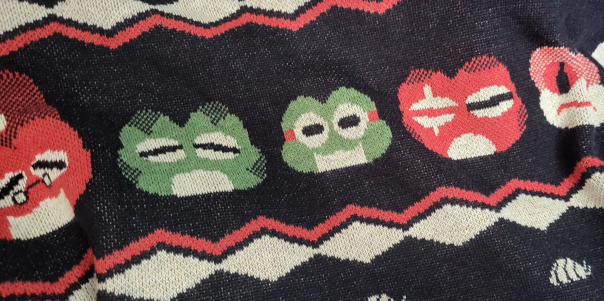 Didn't arrive in time for Christmas, sadly, but my Frogsong Sweater from <a href="/RobaMerch/">RobaRoba - Game Merch For All</a> is finally here! The quality came out great. It's quite cozy and it's so cool seeing a knit sweater with these characters!! 🎄

Has anyone else's sweaters arrived yet? 👀